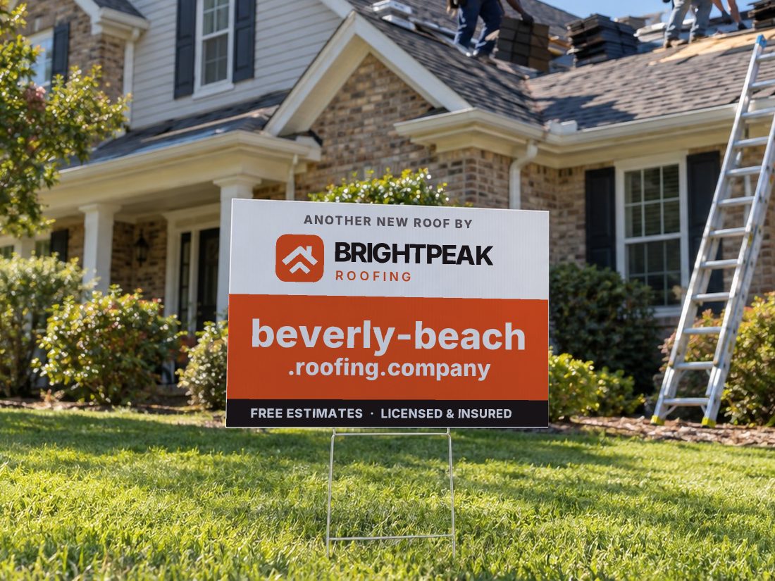 beverly-beach.roofing.company on a yard sign in front of a house getting a new roof